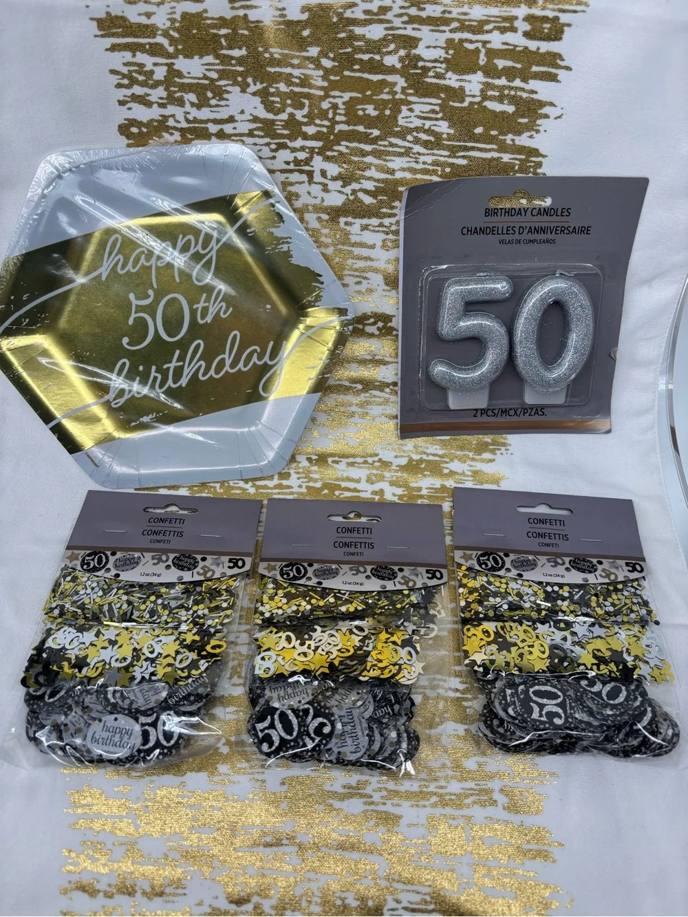 NWT 40 plates, 3 confetti sets, 1 candle 50th birthday kit